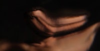 a blurry image of a naked man