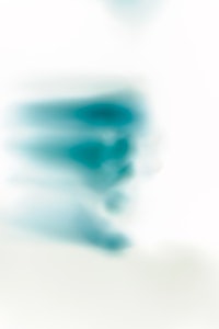 a blurry image of a blue and white background