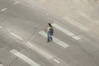 a person is crossing a street